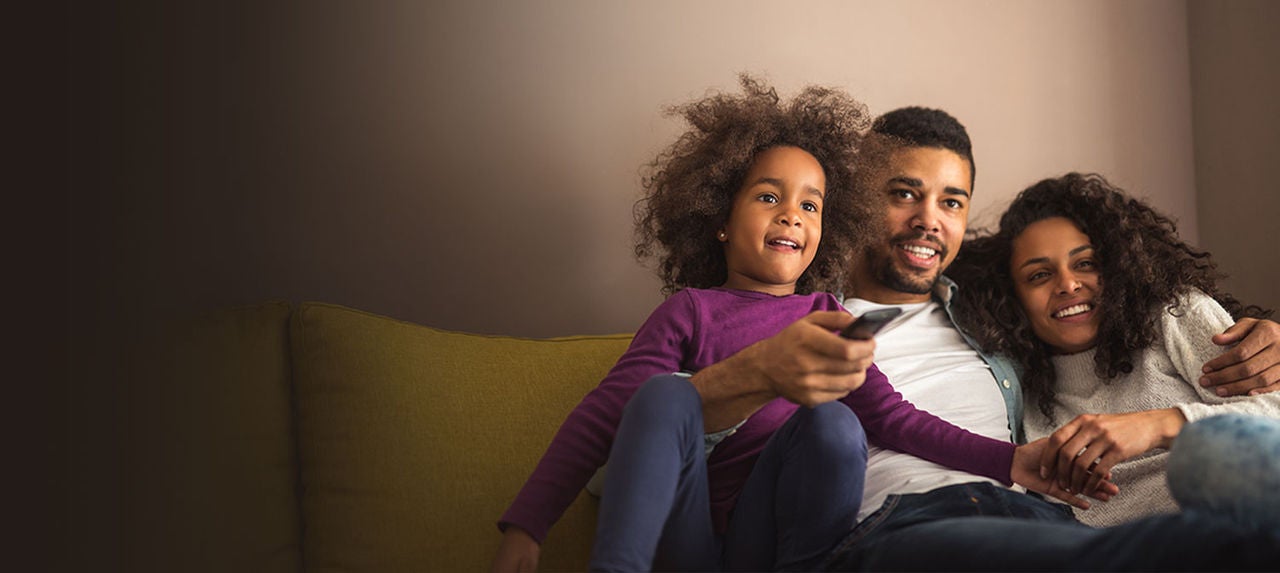 Family watching TV.