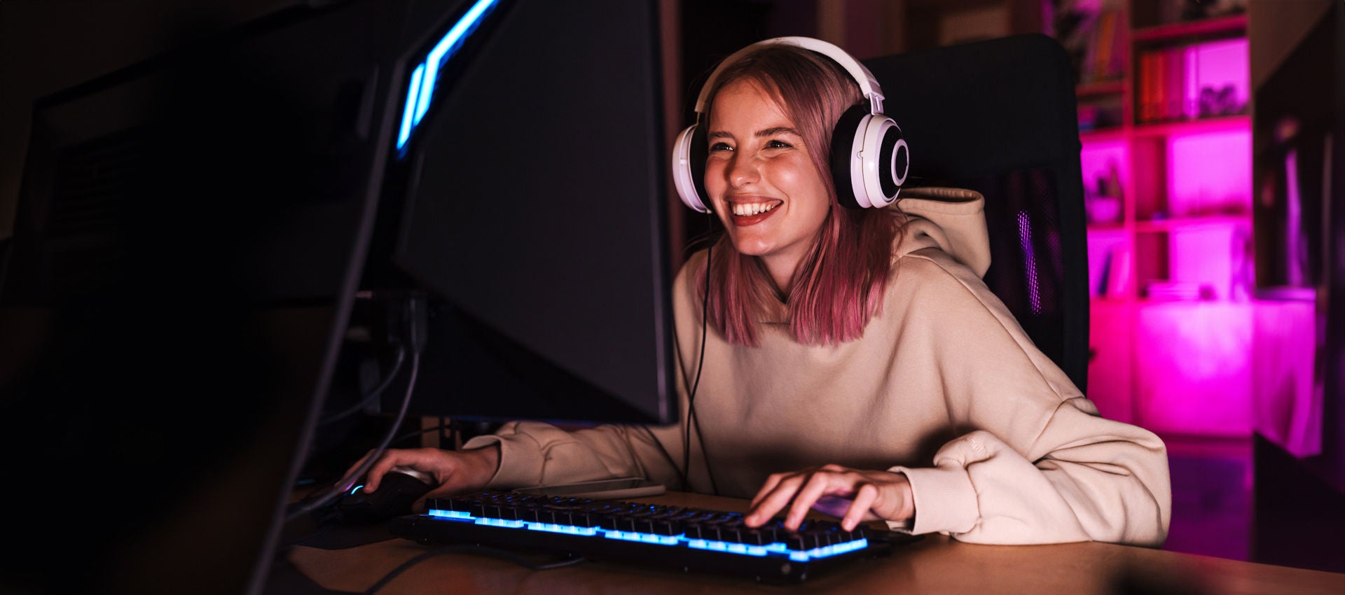 A young woman plays video games.