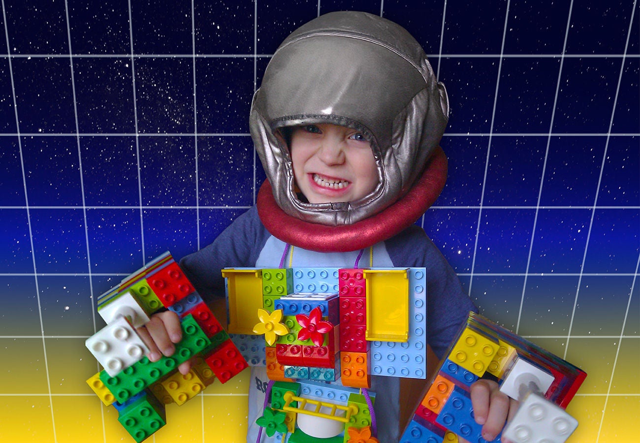 Boy with space suit made of Legos