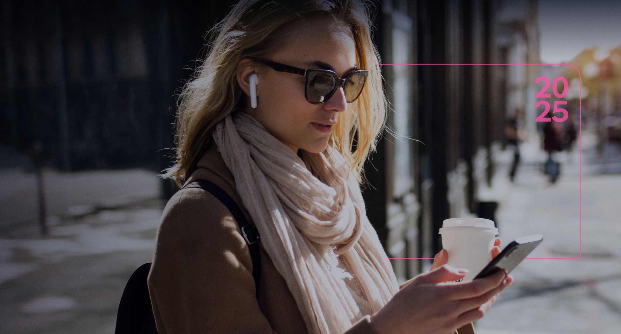 Woman on her cell phone drinking coffee